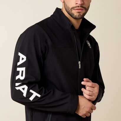 10019279 MNS TEAM SOFTSHELL JKT-BLACK