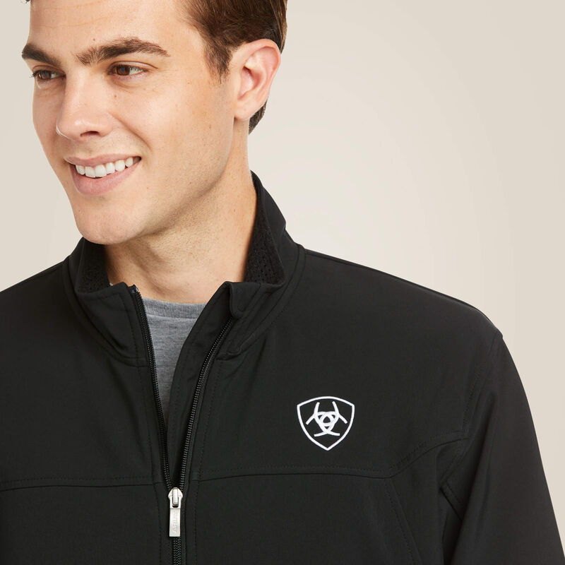 10019279 MNS TEAM SOFTSHELL JKT-BLACK