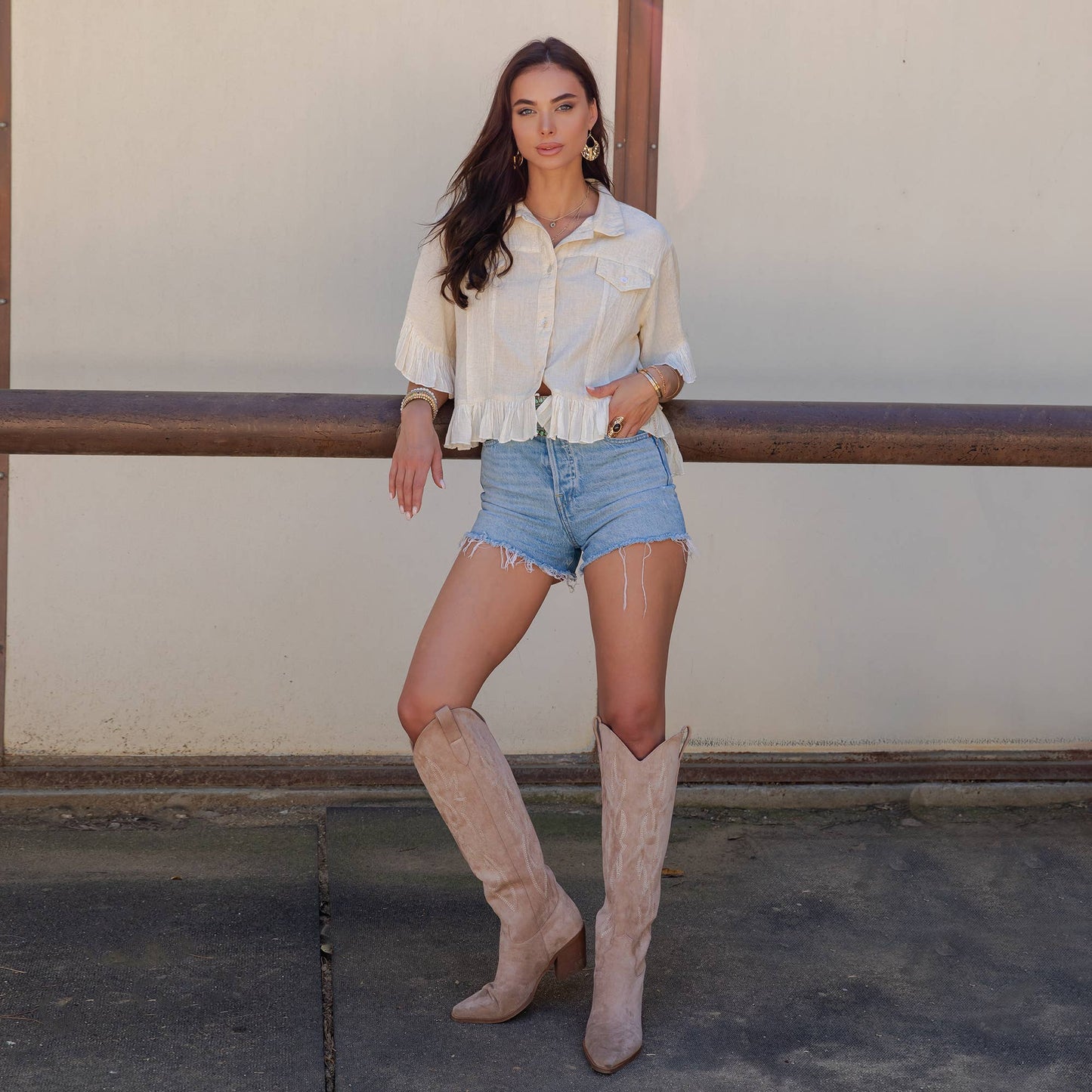 Distressed Denim Crop Jacket with Ruffled Hem