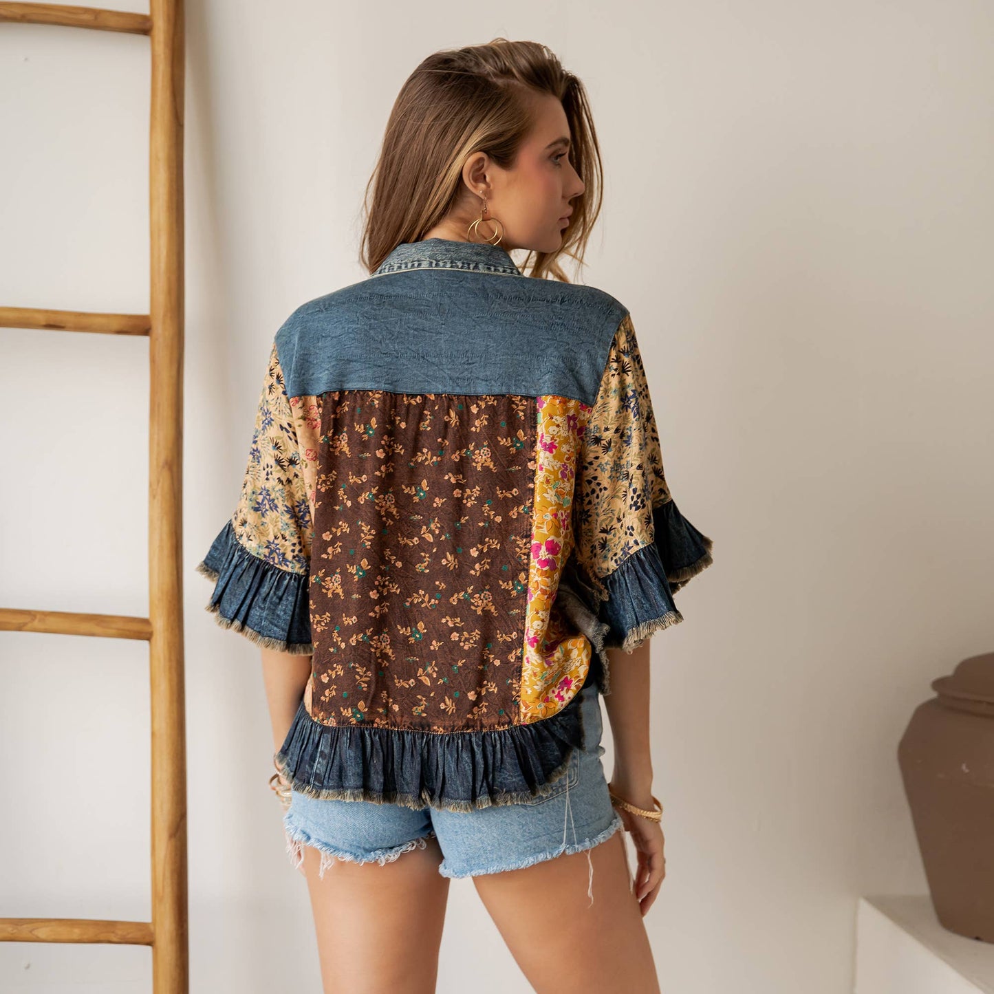 Distressed Denim Crop Jacket with Ruffled Hem